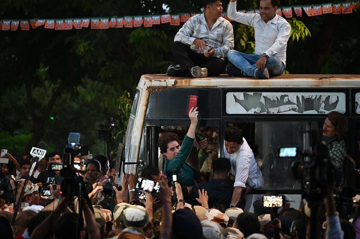 Priyanka Gandhi joined the confrontation, carrying a copy of the Constitution onto the street.