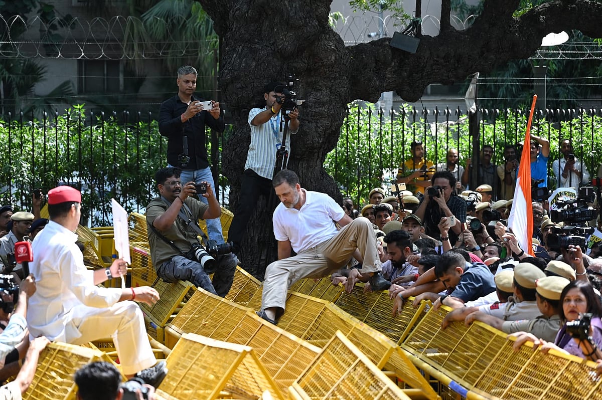 Rahul Gandhi climbed a barricade as police tried to prevent the Opposition from moving ahead.