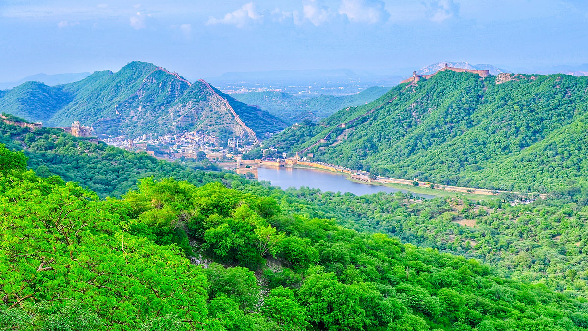 Lush greenery blankets Amber City and the Aravalli Range after rainfall.