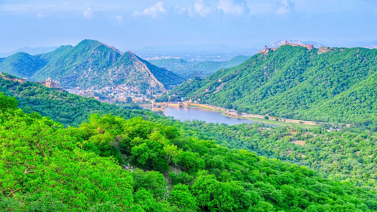 Lush greenery blankets Amber City and the Aravalli Range after rainfall.