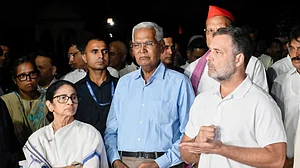 From left: Mamata Banerjee, D Raja, Rahul Gandhi after meeting the President, 9 October