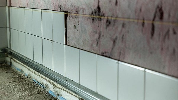 Tile adhesive price in India 2026: per bag, per sq ft and per brand