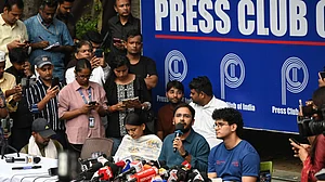 CJP leaders addressing press conference on 11 October