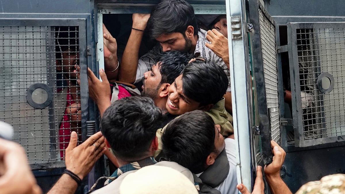 Police detain protestors amid continued protests in Delhi's Connaught Place area, 11 Oct