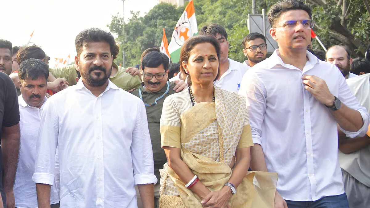 Revanth Reddy (L) with Supriya Sule and Sachin Pilot during the march