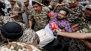 Police detain CPI(M) MP John Brittas in the Connaught Place area, New Delhi, 11 Oct