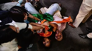 Protesting SFI members being detained in New Delhi, 11 October