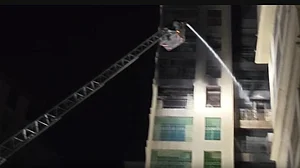 Intense stairwell heat hampered crews’ efforts to reach trapped residents.