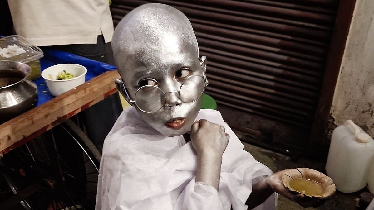 Little Azad 'Gandhi' enjoys his phuchka