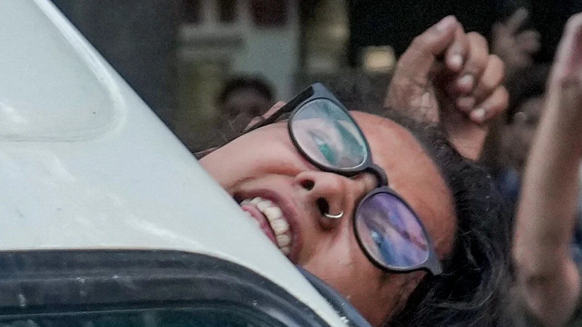 Neha Bora being detained by the police at Mandi House on 16 October