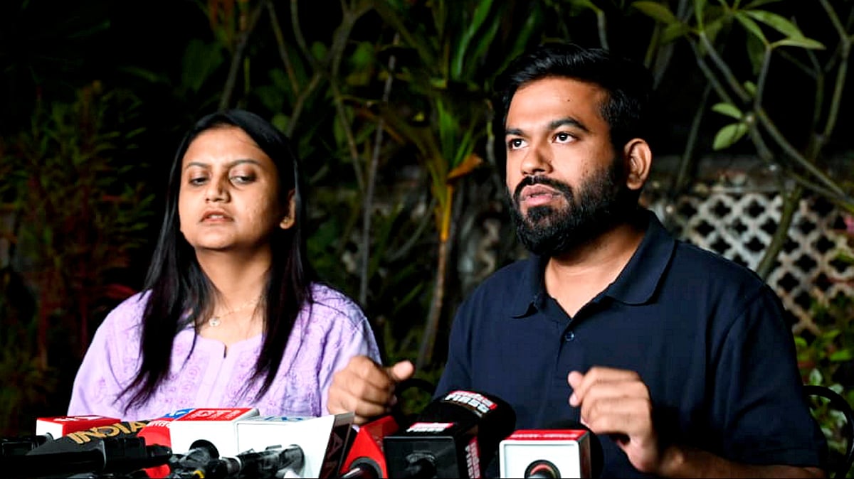 Abhijeet Dipke with legal head Ratna Singh address a press conference.