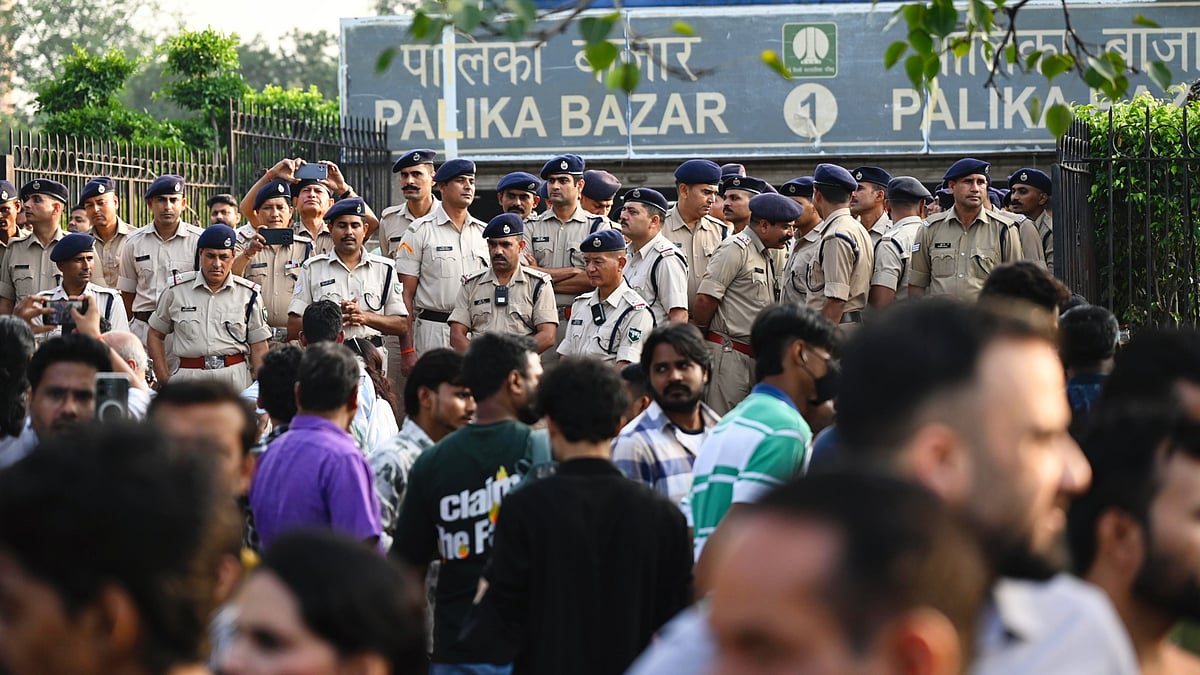 Crowds gather in front of Palika Bazar