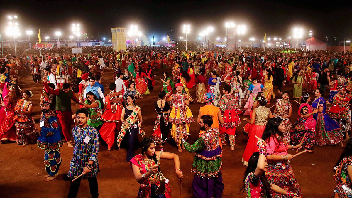 Representative image of youngsters participating in mass 'Garba' and 'Dandiya' programme.