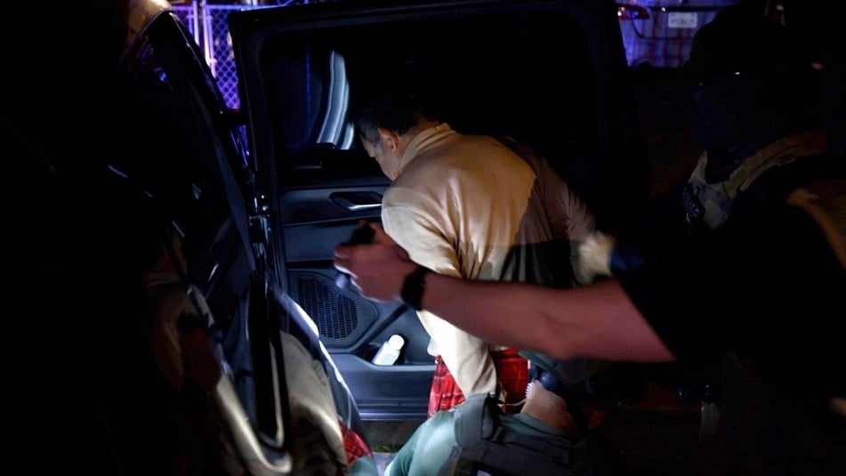 Federal authorities arrest 11 of the 28 defendants during early morning raids across California.