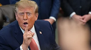 Donald Trump speaks in the Oval Office of the White House.