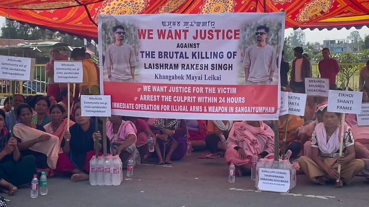 People stage a sit-in protest after deadly clashes between two communities in Manipur.