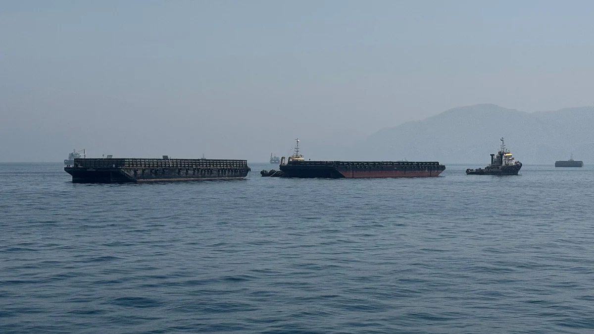 Merchant vessels remain stranded in the Strait of Hormuz.