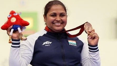 Indian para-shooter Mona Agarwal with Asian Para Games gold medal.