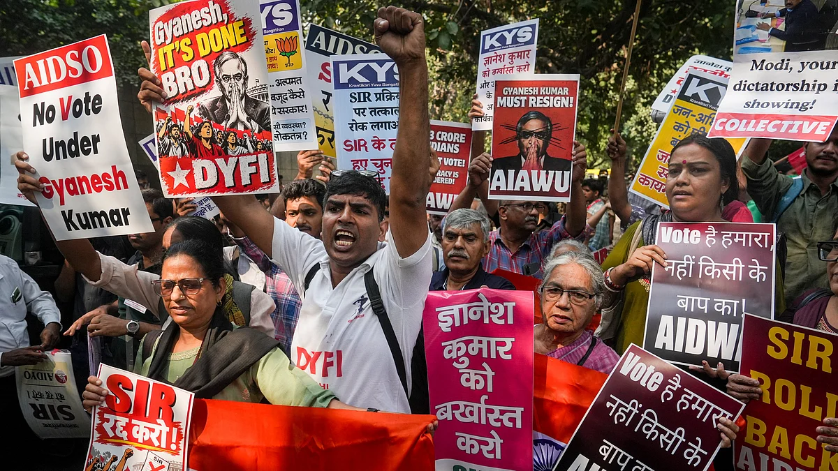 People protest in New Delhi against alleged voter deletions and the SIR of electoral rolls.