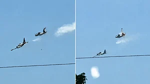 Local media reports said the aircraft collided mid-air before crashing.