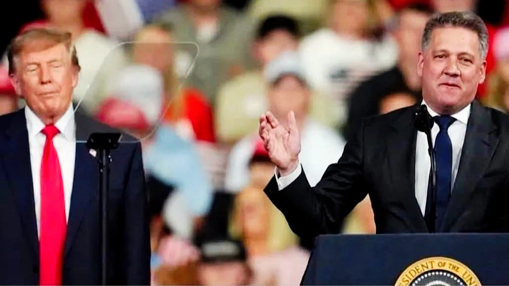 Audi chief executive Gernot Döllner alongside Donald Trump