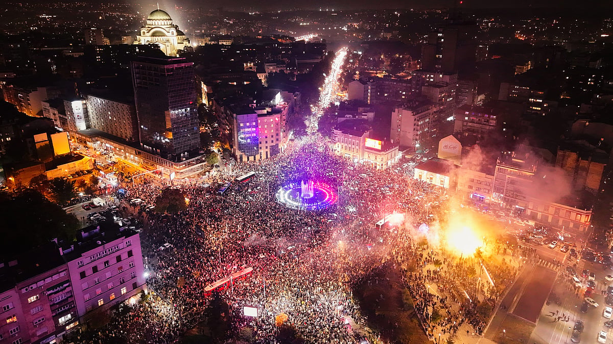 People celebrate after Aleksandar Vucic conceded defeat in Belgrade, Serbia