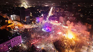 People celebrate after Aleksandar Vucic conceded defeat in Belgrade, Serbia