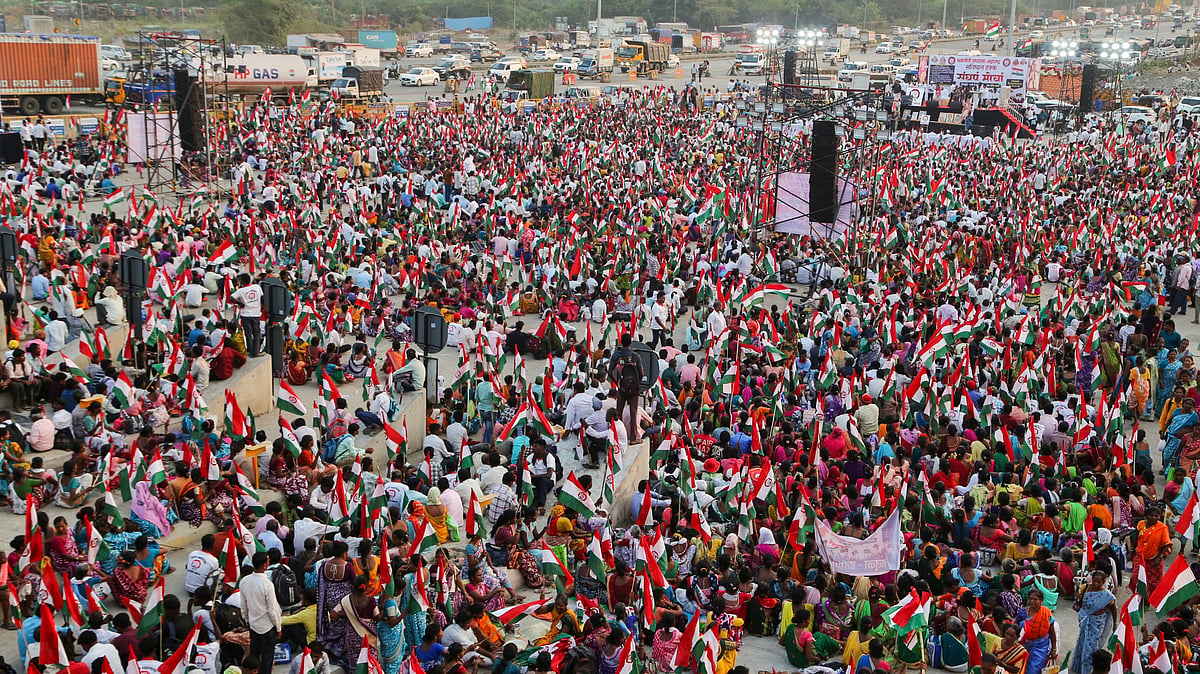 Tribal people participate in  'Constitutional Rights Struggle March', organised by Shramjivi Sanghatana.