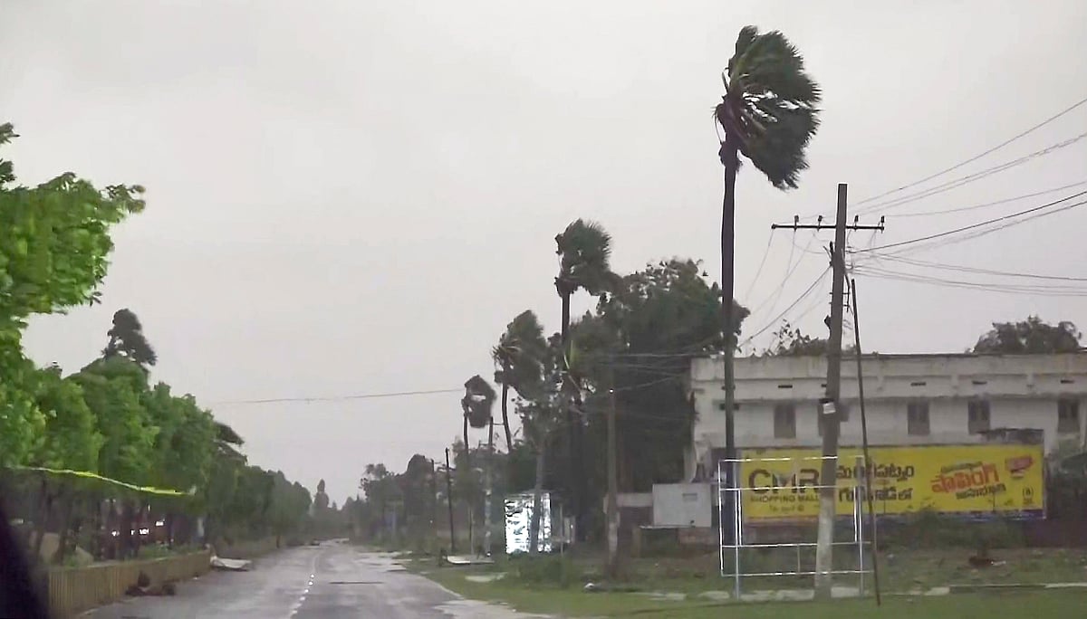 Strong winds and rainfall during Cyclone Arnab's landfall. 