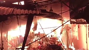 Vendors attempted to rescue their stock as the fire spread through the market.