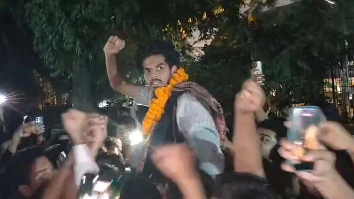 Jamia Millia Islamia student Ebin Basil and others celebrate in New Delhi on 29 October.