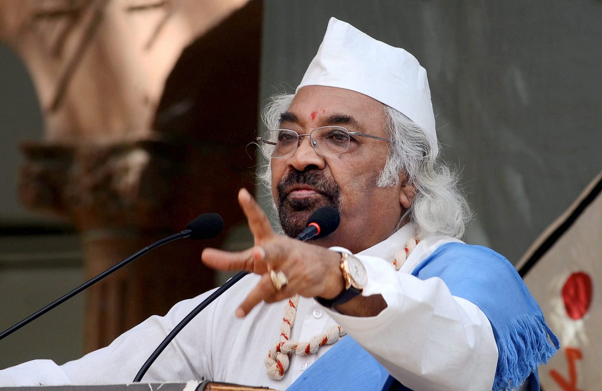 Ahmedabad: Telecom entrepreneur Sam Pitroda addresses during 68th convocation ceremony of Gujarat Vidhyapith in Ahmedabad on Wednesday. PTI Photo (PTI10_18_2017_000052B)