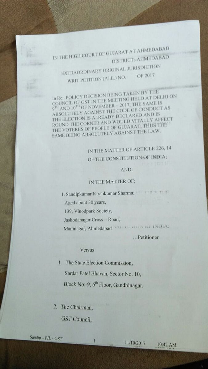 गुजरात चुनाव के लिए मोदी सरकार ने जीएसटी पर घुटने टेके, घटाई दरें, फैसले के खिलाफ हाईकोर्ट में याचिका दायर