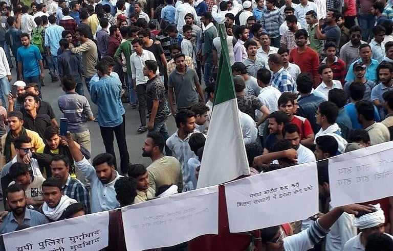 बीजेपी की कोशिशों के बावजूद अलीगढ़ में सौहार्द कायम, एएमयू बन रहा एकता का केंद्र