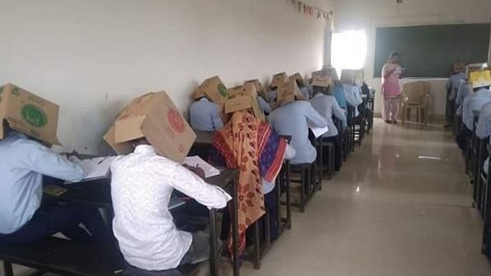 गजब! नकल रोकने के लिए इस राज्य ने निकाला नायब तरीका,  छात्रों को पहना दिए गत्ते के डिब्बे