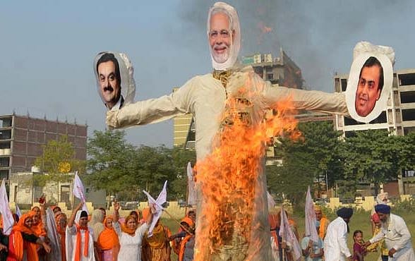 विष्णु नागर का व्यंग्यः मोदी जी उधार की नाक नीची रखिए, जनता मालिक है, कभी भी काट लेगी