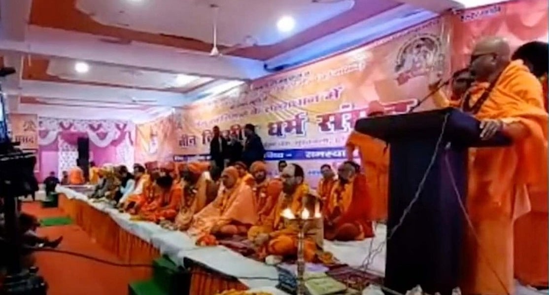 विष्णु नागर का व्यंग्यः बेचारे भगवाधारी हिंदू राष्ट्र के लिए धर्म संसद में फंसे और आका असली संसद के मजे ले रहे!