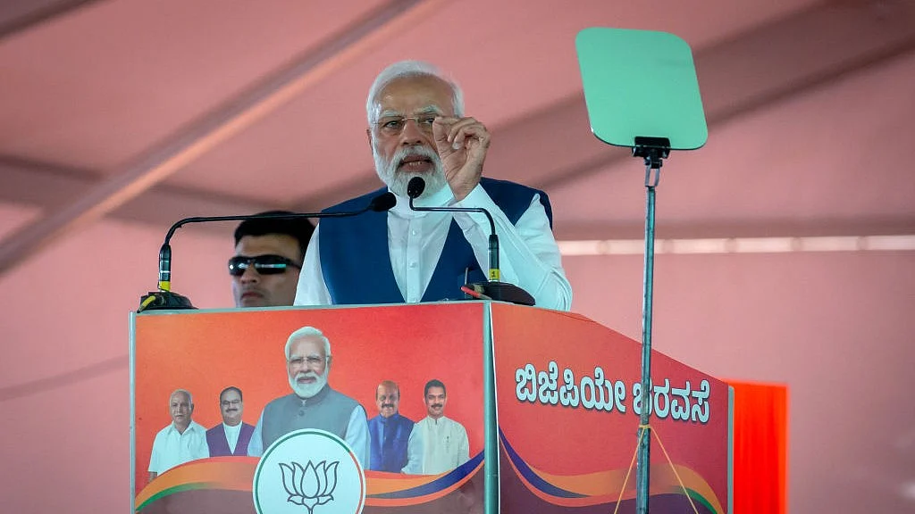 कर्नाटक में बीजेपी की रैली को संबोधित करते प्रधानमंत्री नरेंद्र मोदी (फोटो-Getty Images)