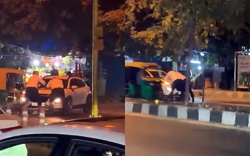 दिल्ली: ट्रैफिक पुलिसकर्मियों ने की कार को रोकने की कोशिश, चालक ने 100 मीटर तक बोनट पर लटकाकर घसीटा  