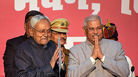 Bihar Governor Rajendra Arlekar with JD(U) leader Nitish Kumar after the latter took oath as Bihar CM during the swearing-in ceremony of new state government, at Raj Bhavan in Patna, on Sunday, January 28, 2024