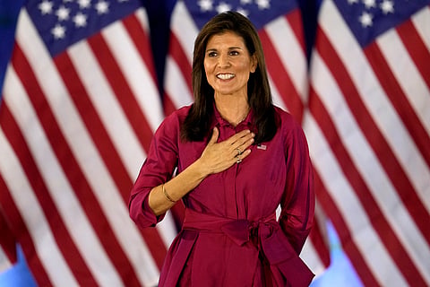 Republican presidential candidate former UN Ambassador Nikki Haley gestures to the audience as she concludes a speech at a caucus night party at the Marriott Hotel in West Des Moines, Iowa, Monday, Jan. 15, 2024. 