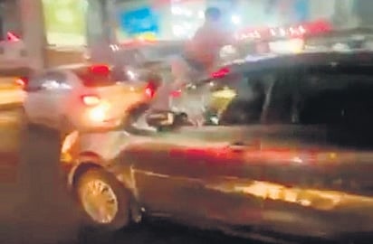 One of the passersby jumped on the bonnet in a bid to force Ali to stop the car. Once he slowed down, the crowed which gathered around the car thrashed Ali. 