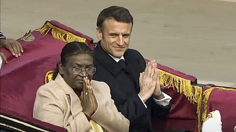 President Droupadi Murmu with chief guest French President Emmanuel Macron arrives during the 75th Republic Day celebrations at the Kartavyapath, in New Delhi, Friday, Jan. 26, 2024. 
