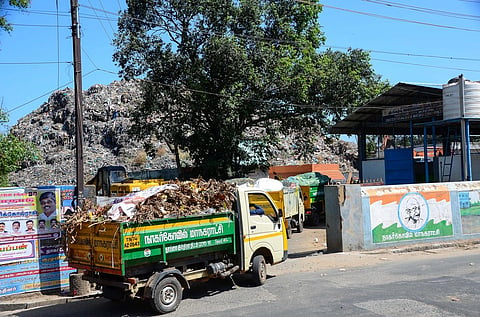 Huge amount of garbage collected from household and dumped near Valampuri Vilai corporation garbage yard at Nagercoil in Kanyakumari district. express