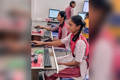 Girl students learn to use computers in Maskapur ZPSS in Nirmal district