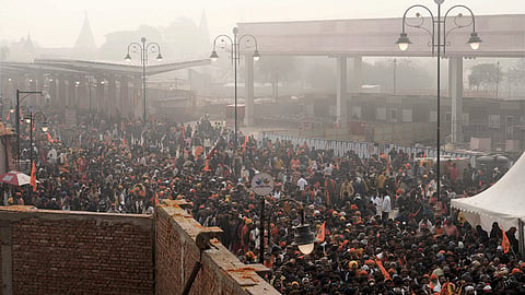 Huge crowd of devotees gather near the main gateway leading to the Ram temple, in Ayodhya, Tuesday, Jan. 23, 2024. 