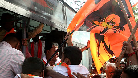 BJP leaders and supporters protest in Bengaluru on Monday against the lowering of Hanuman Dwaja at Mandya district.