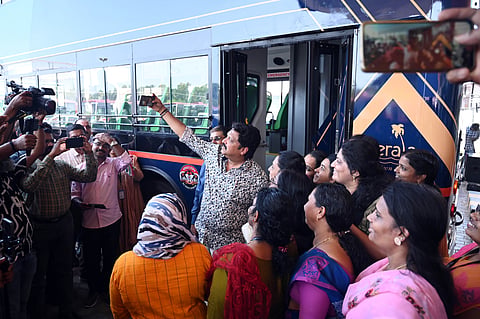 Transport Minister K B Ganesh Kumar takes a selfie after inaugurating the new electric double-decker bus at KSRTC Swift headquarters in Anayara, Thiruvananthapuram, on Thursday.