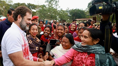 Assam women let queue to greet congress leader Rahul Gandhi. 