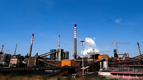 A picture taken on July 23, 2019 shows the steel manufacturing giant Arcelor Mittal Italia (ex ILVA ) plant, in Taranto, southern Italy. 